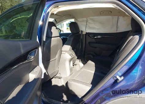 2023 Buick Envision Essence Fwd z USA, uszkodzony, nr VIN LRBFZNR44PD055703